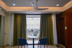 Posedenie v ubytovaní LeafyInn Premium 2BHK Apartment-Khanapara