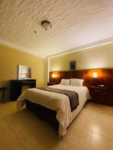 Postelja oz. postelje v sobi nastanitve Hotel Guacamaya