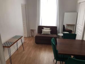 Istumisnurk majutusasutuses Très joli appartement à Puteaux centre ville