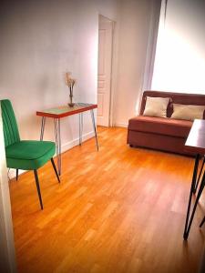 Istumisnurk majutusasutuses Très joli appartement à Puteaux centre ville