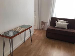 Istumisnurk majutusasutuses Très joli appartement à Puteaux centre ville