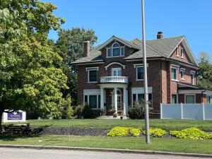 a house on the corner of a street at VIP Suites for Business Women, Nurses, College Moms Traveling to Indianapolis in Indianapolis