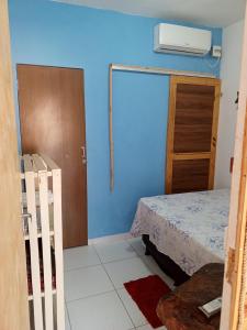 Ein Bett oder Betten in einem Zimmer der Unterkunft Chalés Mirante do Mar