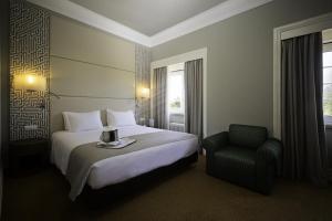 Ένα ή περισσότερα κρεβάτια σε δωμάτιο στο Hotel Miraparque