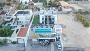 an aerial view of a house with a swimming pool at WL IMPERIO HOTEL POUSADA in Canoa Quebrada