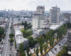 an aerial view of a city with traffic at ibis Kyiv City Center in Kyiv