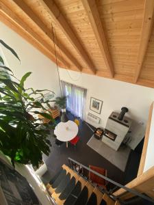 an overhead view of a living room with wood ceilings at Ferienhaus Annemie in Markt Erlbach