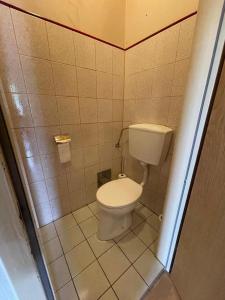 Ett badrum på Villa Ganzstein Appartement