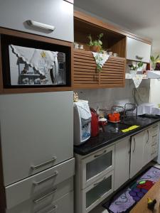 Kuchnia lub aneks kuchenny w obiekcie Apartamento Beira Mar.