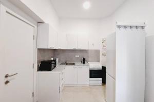 Kuchyňa alebo kuchynka v ubytovaní CheckInVienna-One bedroom Apartment