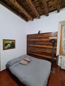 Ένα ή περισσότερα κρεβάτια σε δωμάτιο στο Garden House Trezzo