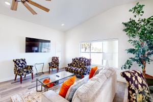 a living room with a couch and chairs at Corpus Christi's Charmer in Corpus Christi