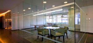 a dining room with a table and chairs at AMAZING REFORMA APARTMENT, 2 brms 2 bath, AWESOME in Mexico City +37 photos