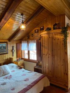 Postel nebo postele na pokoji v ubytování Stella Alpina, in Via Medail con vista incantevole sulle Alpi