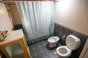 Een badkamer bij Alojamiento Del Bosque