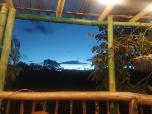 a view from the deck at night at Cabaña Luna Verde in San Vicente