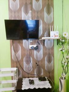 TV a/nebo společenská místnost v ubytování Syukur Homestay Ipoh