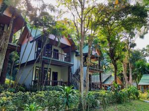 a house in the middle of some trees at Dream Valley Resort, Tonsai Beach in Tonsai Beach