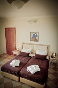 A bed or beds in a room at Sea View Resorts & Spa