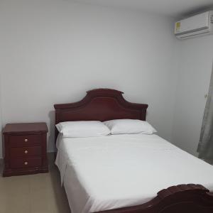 Postel nebo postele na pokoji v ubytování Hotel Velices