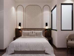Voodi või voodid majutusasutuse L'amant de Hanoi Hotel - khách sạn Lamant de Hà Nội toas
