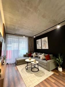 Χώρος καθιστικού στο Appartement neuf 2 chambres avec salle de sport