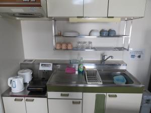 Kuchyň nebo kuchyňský kout v ubytování 札幌市中心部大通公園まで徒歩十分観光移動に便利なロケーションh208#16