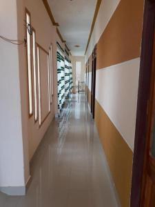 a hallway of a building with a long corridor at Ngọc Nga Hotel in Phan Rang–Tháp Chàm