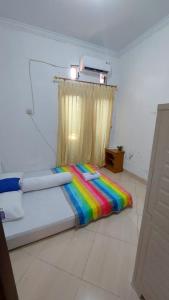 Кровать или кровати в номере Shanay Homestay