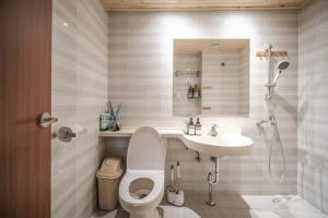 a bathroom with a toilet and a sink at nice and kind home choijeri minsuk in Seoul