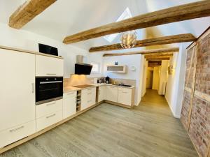 Kuchyňa alebo kuchynka v ubytovaní Stromkaje