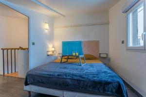 Ένα ή περισσότερα κρεβάτια σε δωμάτιο στο Dionysos