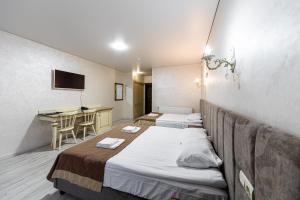 Postel nebo postele na pokoji v ubytování Diamond Resort White