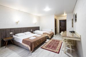 Postel nebo postele na pokoji v ubytování Diamond Resort White