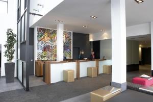 a rendering of a lobby with a reception desk at Hôtel Alt Québec in Quebec City