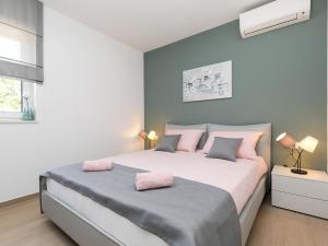 Posteľ alebo postele v izbe v ubytovaní Villa GreenBlue