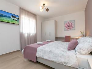 Posteľ alebo postele v izbe v ubytovaní Villa GreenBlue