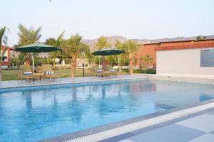 Bazén v ubytování Spree Resort Sariska nebo v jeho okolí
