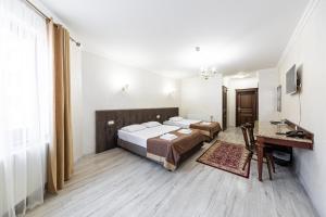 Postel nebo postele na pokoji v ubytování Diamond Resort White