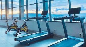 two exercise bikes in a gym in a building at Jesselton QUAY PICKNSTAY 拾旅 near gaya street near jesslton point near suria sabah in Kota Kinabalu