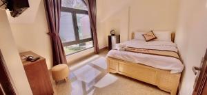 Postel nebo postele na pokoji v ubytování An Nhien Hotel