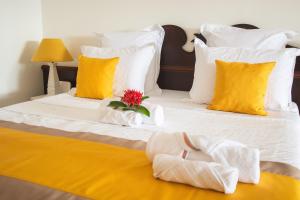 Cama ou camas em um quarto em Tropicanavibes - Vue mer à Sainte-Luce