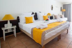 Cama ou camas em um quarto em Tropicanavibes - Vue mer à Sainte-Luce