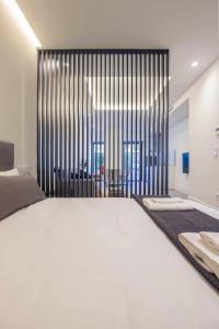 Ένα ή περισσότερα κρεβάτια σε δωμάτιο στο Apartamento Presidente 1