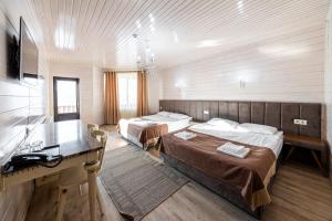Postel nebo postele na pokoji v ubytování Diamond Resort White