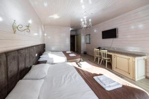 Postel nebo postele na pokoji v ubytování Diamond Resort White