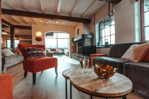 Χώρος καθιστικού στο Le Grand Cerf 25 pers, Malmedy- Chalet rustique, jardin