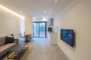 Μια τηλεόραση ή/και κέντρο ψυχαγωγίας στο Apartamento Presidente 2