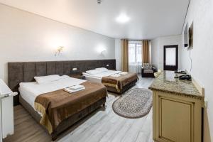Postel nebo postele na pokoji v ubytování Diamond Resort White