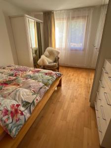Ένα ή περισσότερα κρεβάτια σε δωμάτιο στο Privat Bed and Breakfast in Flims Waldhaus